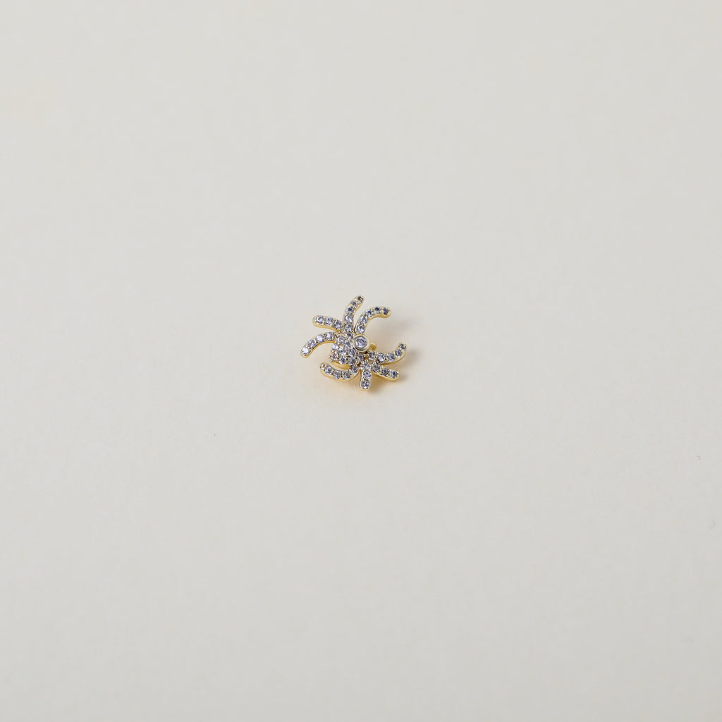 Gold and crystal accented spider charm