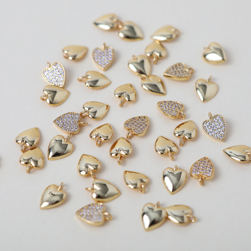 gold and crystal accented heart charms