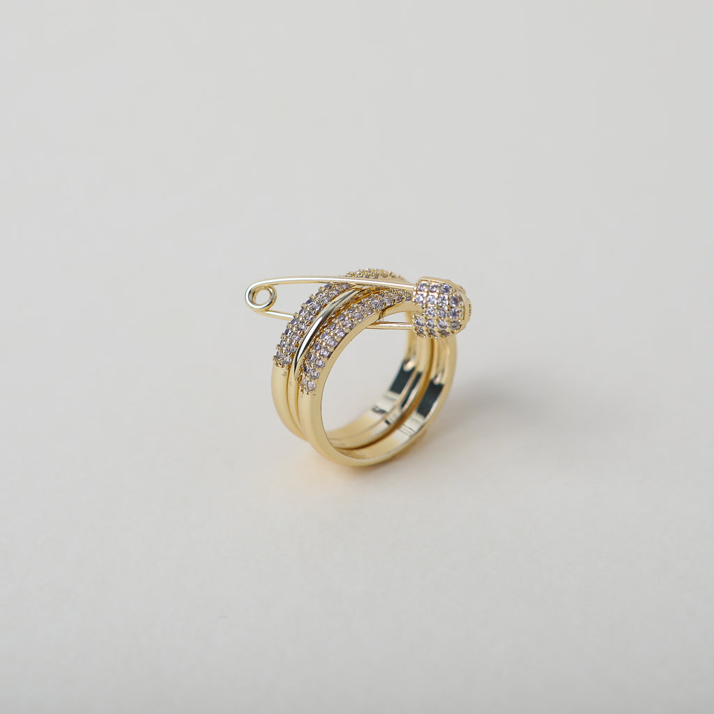 Stackable gold and crystal accented safety pin rings