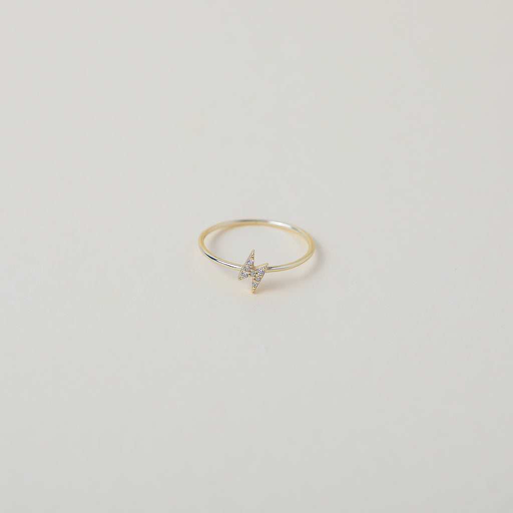 gold crystal accented lightening bold ring