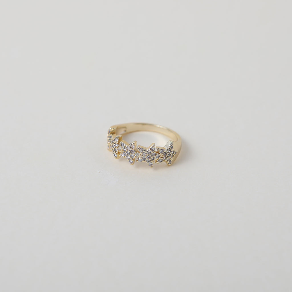 Crystal accented gold star ring