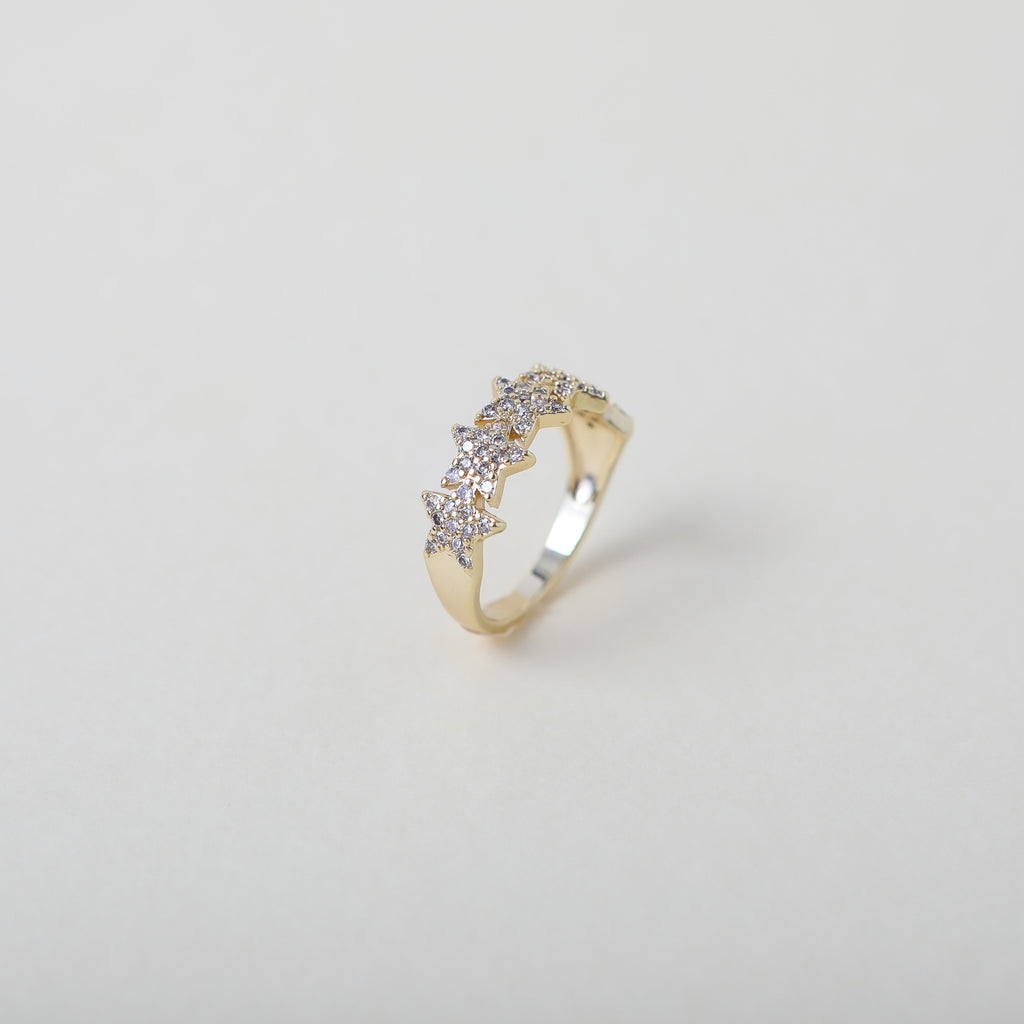 Crystal accented gold star ring