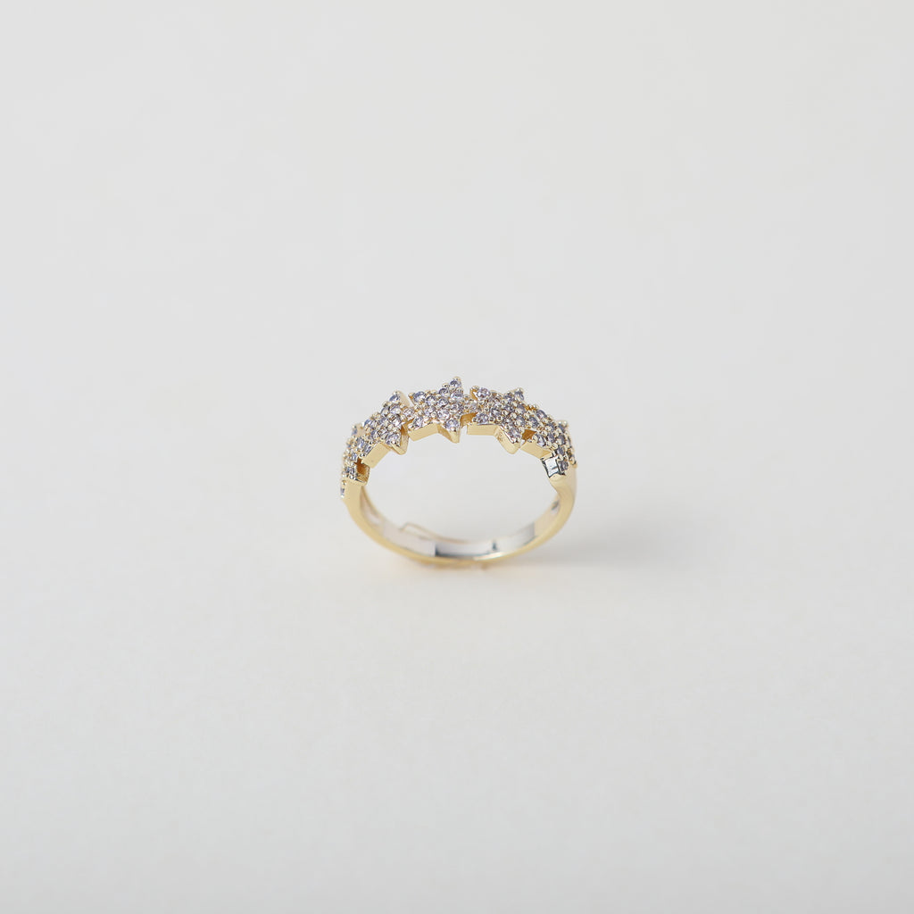 Crystal accented gold star ring