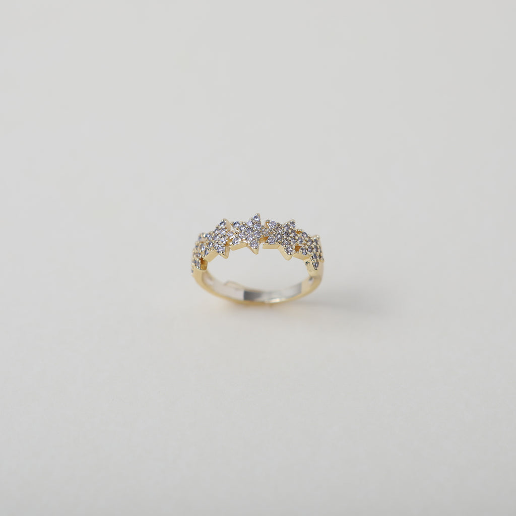 Crystal accented gold star ring