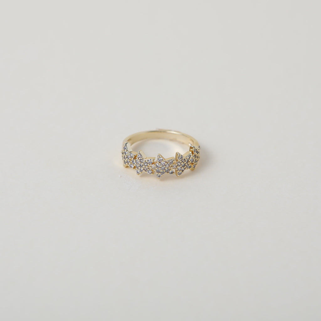 Crystal accented gold star ring