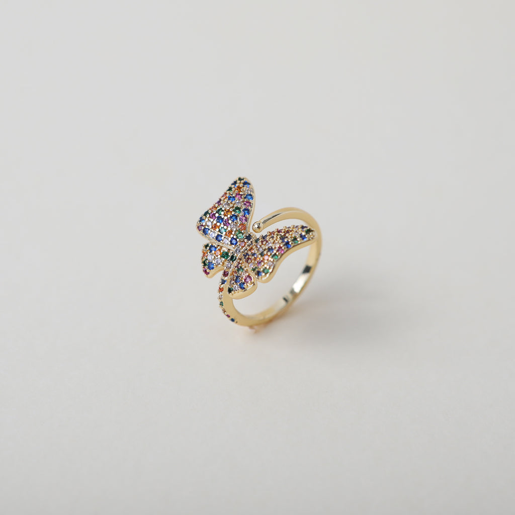 Adjustable butterfly ring with rainbow crystal embellishments