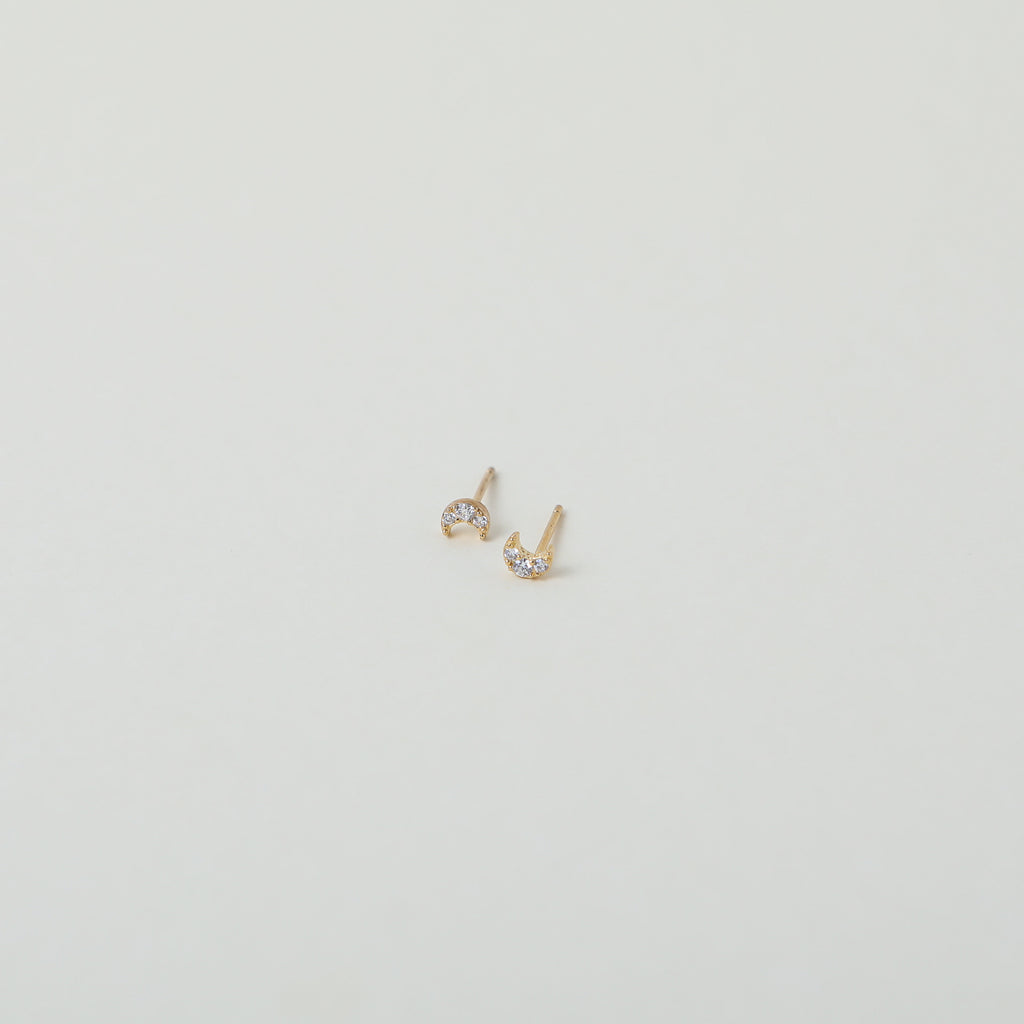 Micro gold moon studs with crystal accents