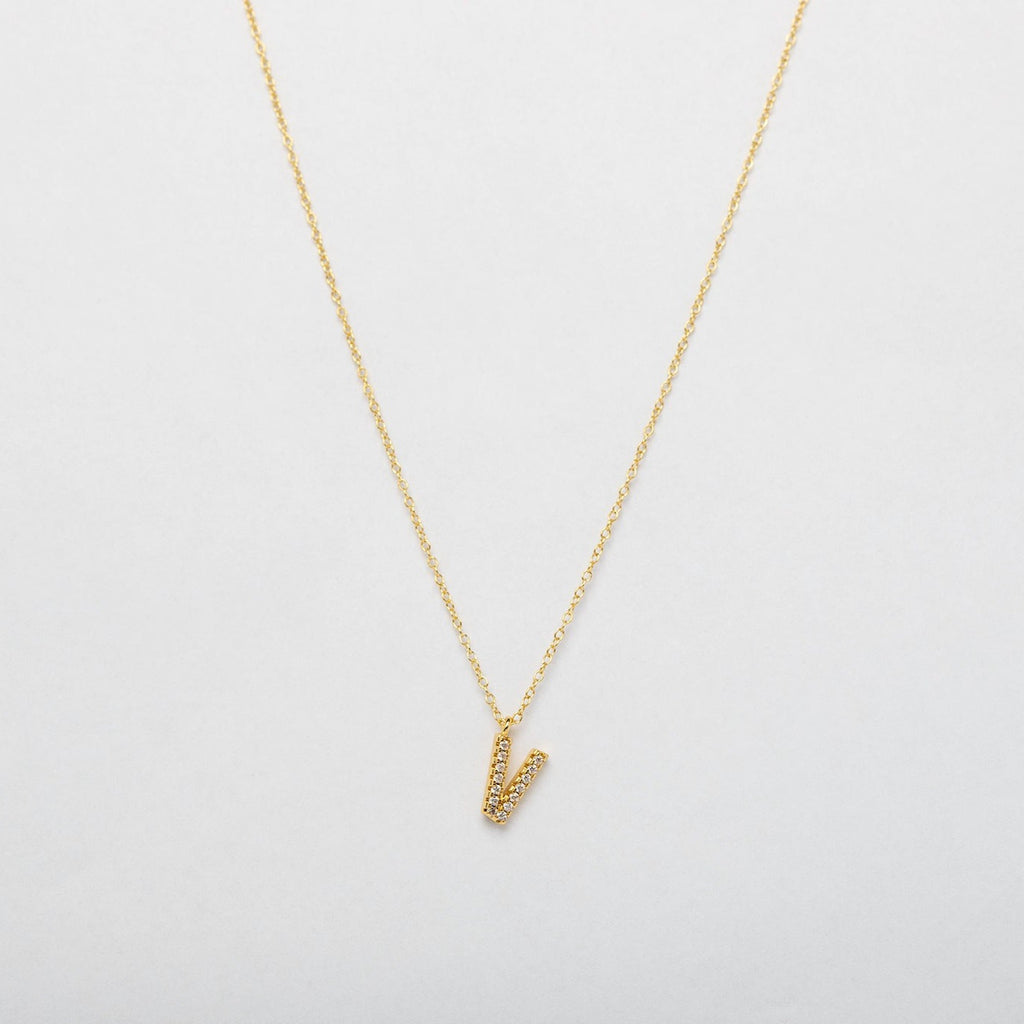 gold necklace with alphabet charm