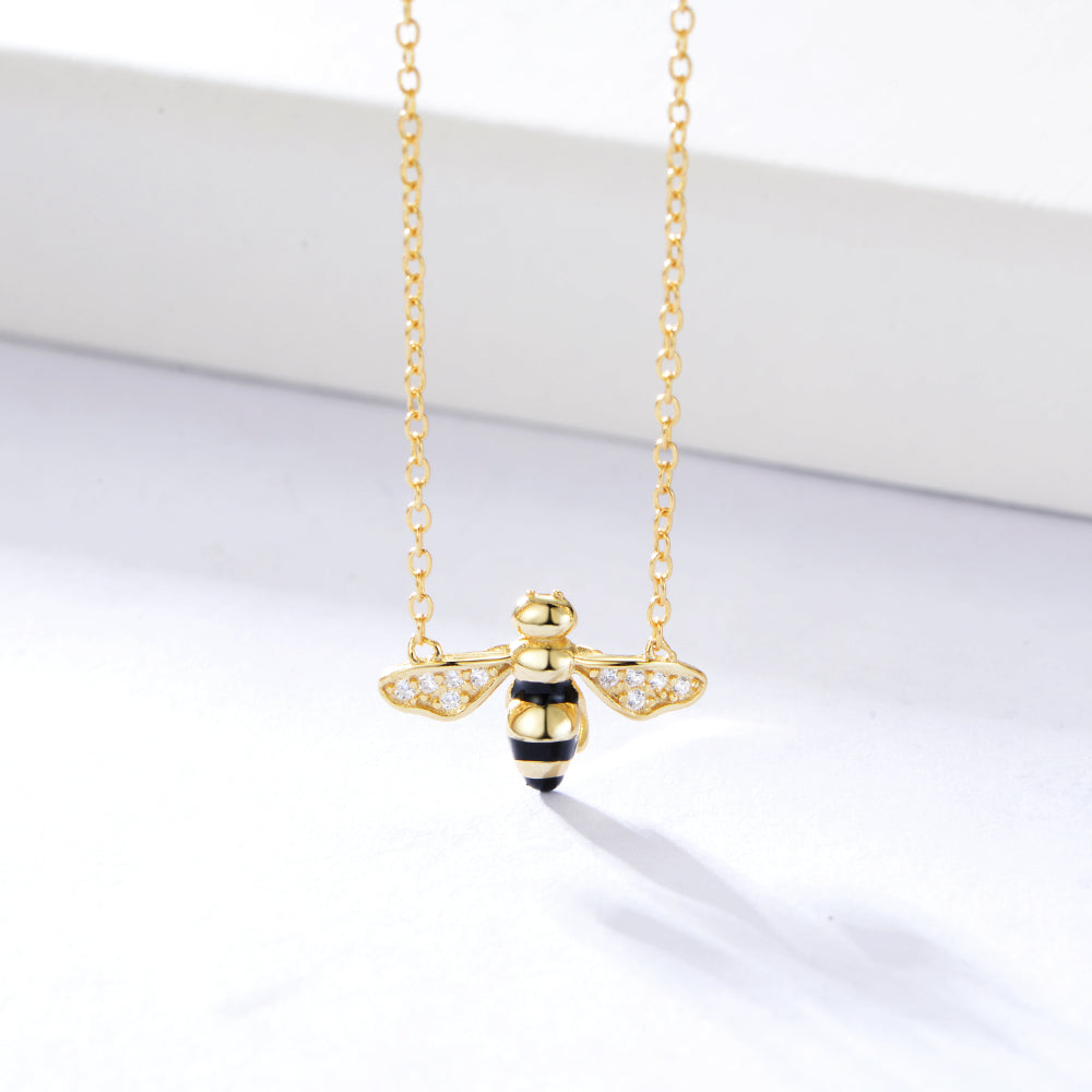 Gold chain with gold and crystal accented honey bee pendant